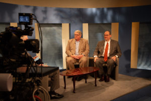 Image of Thomas L. Brunell, Ph.D. and Matthew Wilson, Ph.D. on the McCuistion Program set.